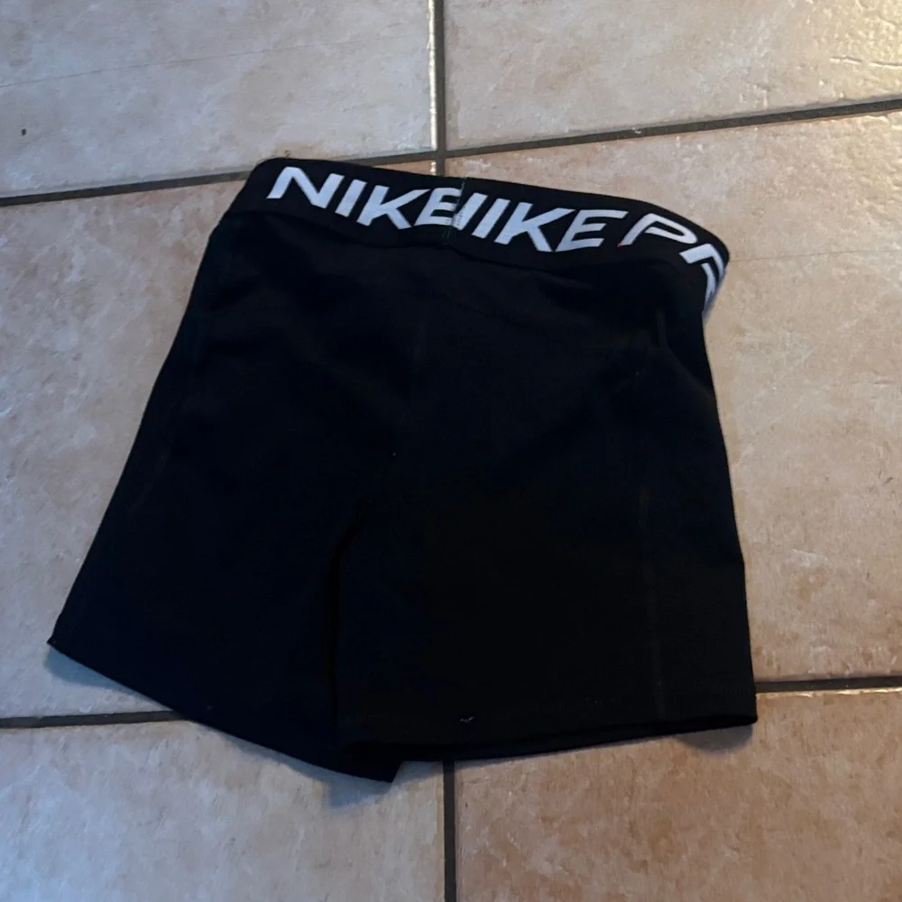 Nike Black Girls' Training Compression Shorts with White Logo Waistband